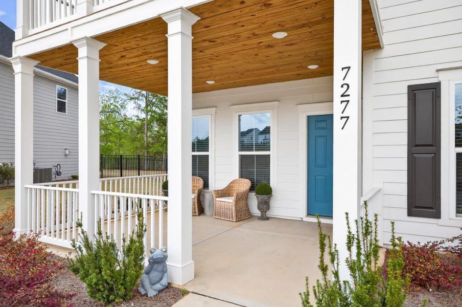 Exterior details and patio area of a home in Reunion, Flowery Branch (Image 28).