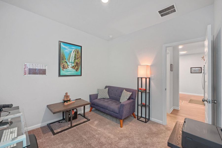 Furnished interior view inside a new home in Stallion Run, Buda (Image 23).