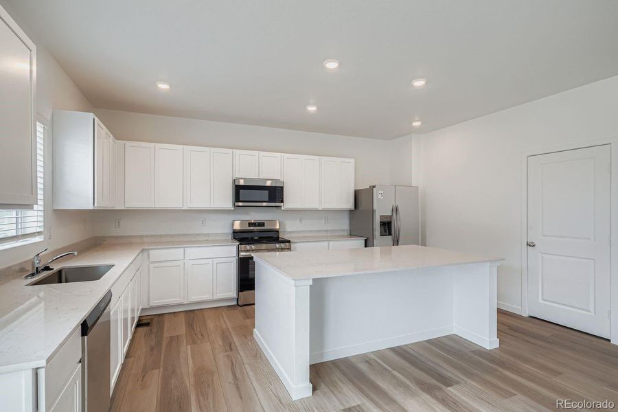 Furnished interior view inside a new home in , Thornton (Image 7).