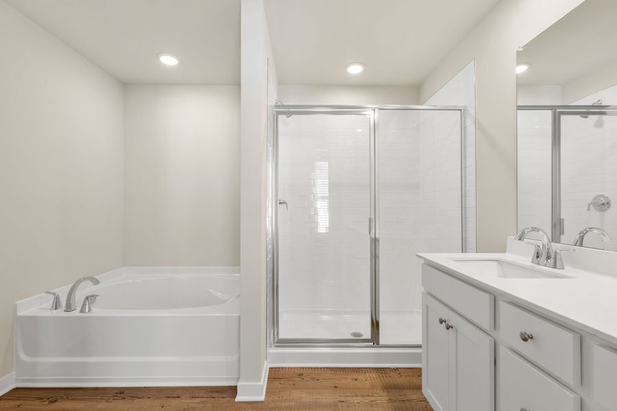 A bathroom with a glass shower.