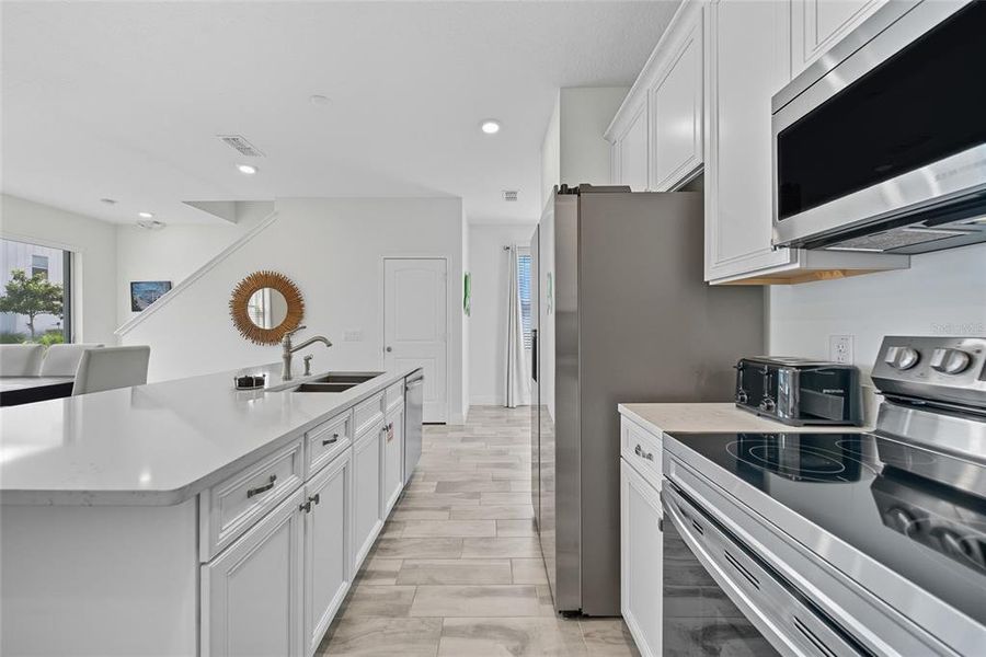 Furnished interior view inside a new home in , Kissimmee (Image 16). Furnished interior view inside a new home in , Kissimmee (Image 16).