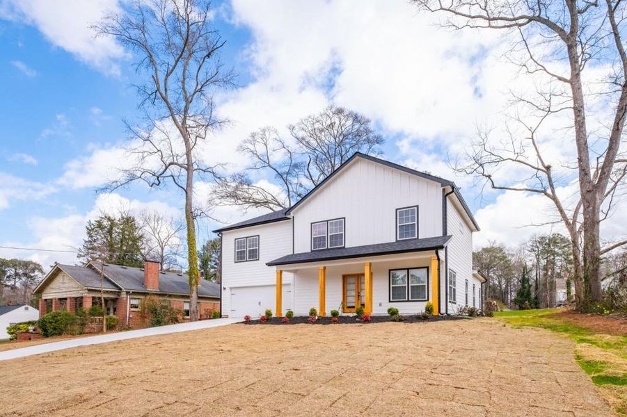 Front exterior of a new home in , Fairburn, GA, highlighting curb appeal (Image 26).