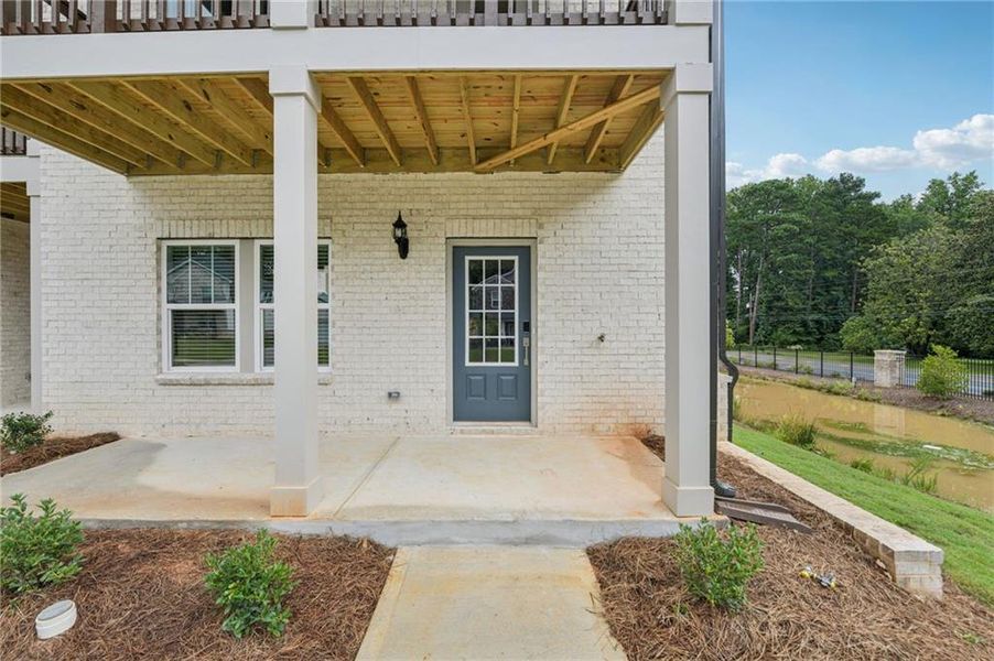 Exterior details and patio area of a home in Martin Springs - Highland Series, Lawrenceville (Image 27).