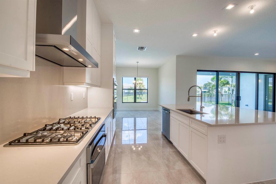 Furnished interior view inside a new home in Apex at Avenir, Palm Beach Gardens (Image 26).