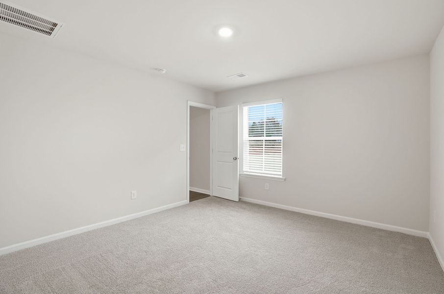 Representative unfurnished interior of a home built from the Spruce L by McGuinn Homes in Sibley Village, Sumter (Image 18).