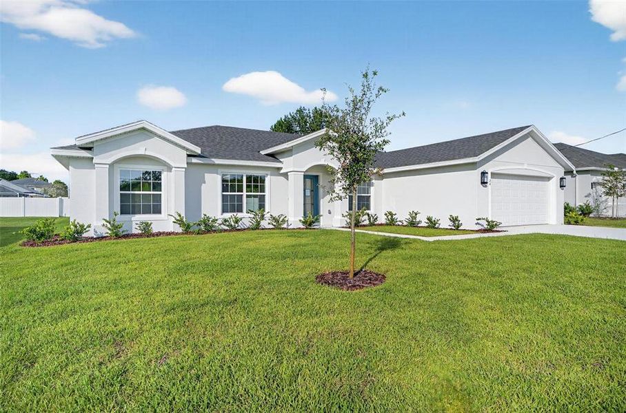Front exterior of a new home in , Palm Coast, FL, highlighting curb appeal (Image 23).