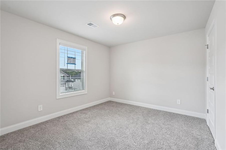 Spacious, unfurnished interior of a new home in Hemingway - Reserve Series, Cumming (Image 22). Spacious, unfurnished interior of a new home in Hemingway - Reserve Series, Cumming (Image 22).