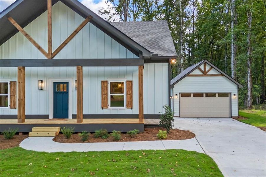 Front exterior of a new home in , Monroe, GA, highlighting curb appeal (Image 1).