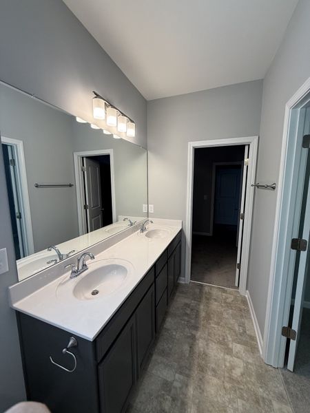 primary bathroom with 2 sinks