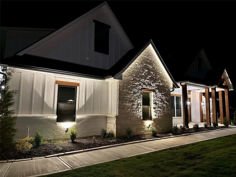 Front exterior of a new home in , Caddo Mills, TX, highlighting curb appeal (Image 1). Front exterior of a new home in , Caddo Mills, TX, highlighting curb appeal (Image 1).