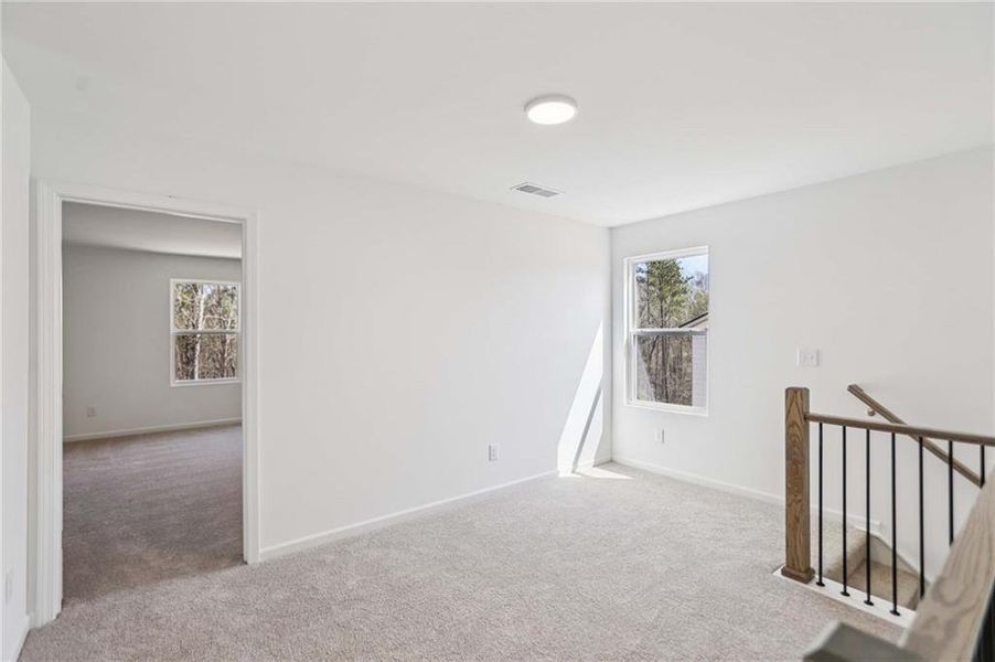 Spacious, unfurnished interior of a new home in The Pointe at Heron Bay, Locust Grove (Image 22).