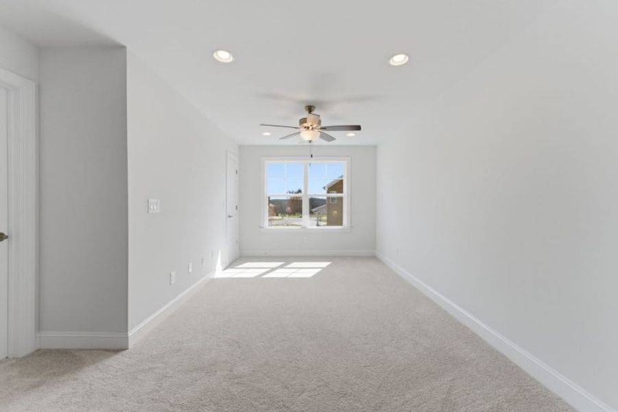 Representative unfurnished interior of a home built from the Fairfield Lux by Keystone Homes NC in Weybridge, Burlington (Image 104).