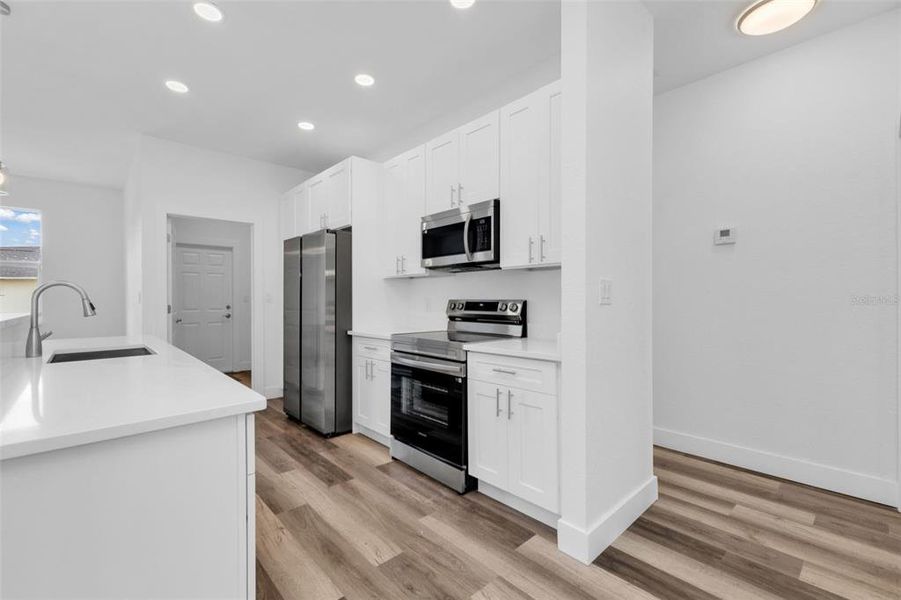 Furnished interior view inside a new home in , Punta Gorda (Image 8).