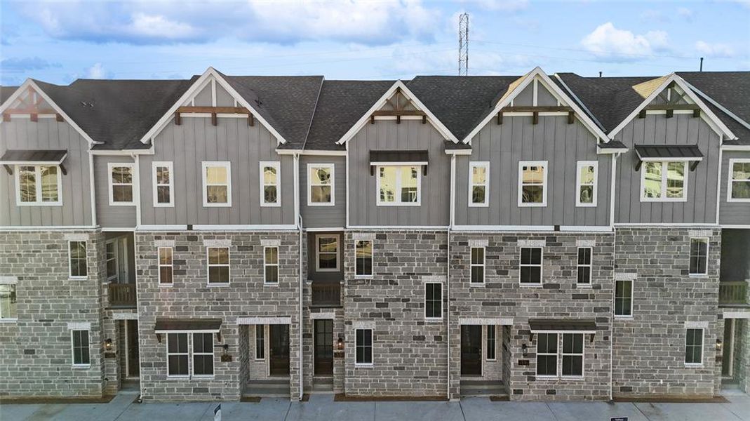Front exterior of a new home in Collin Creek, Plano, TX, highlighting curb appeal (Image 2).