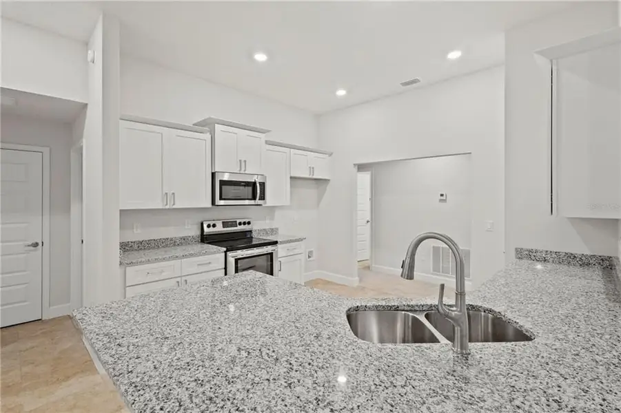 Furnished interior view inside a new home in Royal Highlands, Weeki Wachee (Image 4).