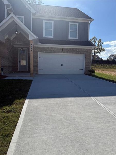 Exterior details and patio area of a home in The Fairways at Mirror Lake, Villa Rica (Image 3).