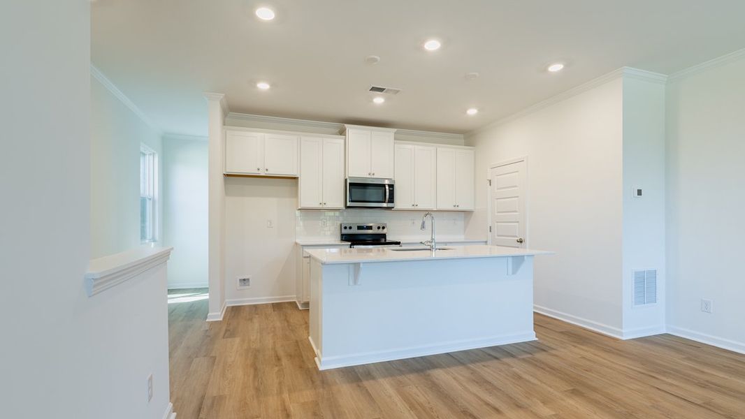 Furnished interior view inside a new home in Benteen Reserve, Atlanta (Image 5).