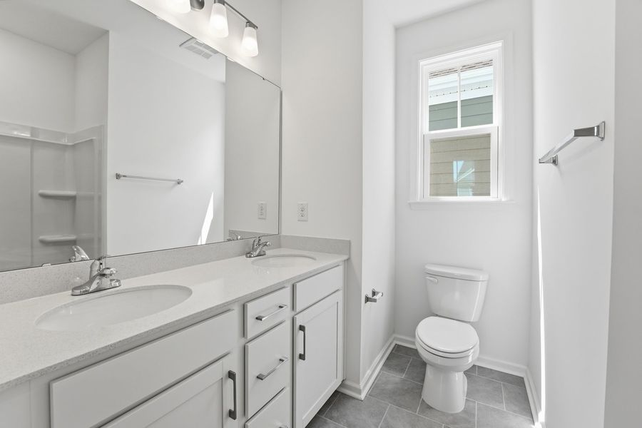 Representative furnished interior of a home built from the Blair by Brookfield Residential in Wendell Falls, Wendell (Image 9).