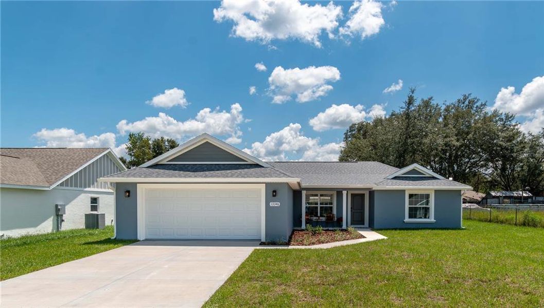 Front exterior of a new home in , Dunnellon, FL, highlighting curb appeal (Image 21).