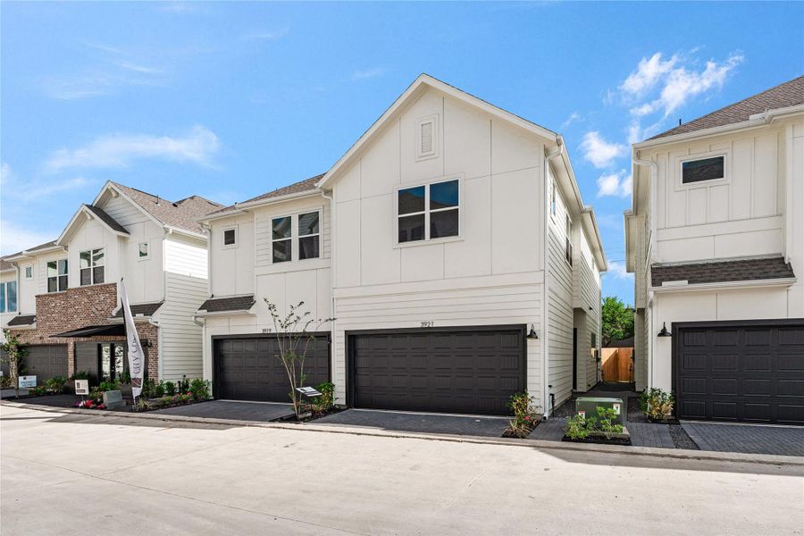 Front exterior of a new home in Willowbend Point, Houston, TX, highlighting curb appeal (Image 20).
