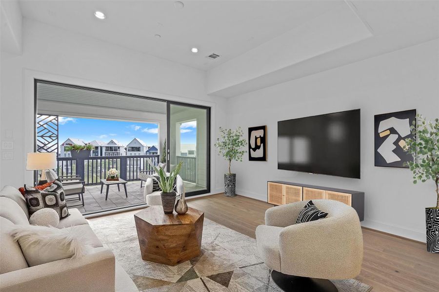 Another set of Tri-Paneled Sliding Glass Doors Take you From the Another set of Tri-Paneled Sliding Glass Doors Take you From the