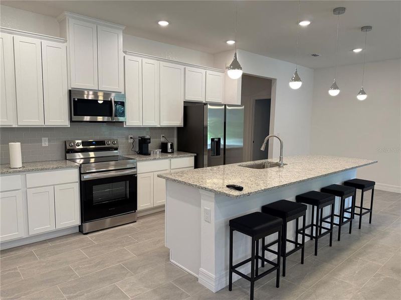 Furnished interior view inside a new home in , Port Charlotte (Image 4).