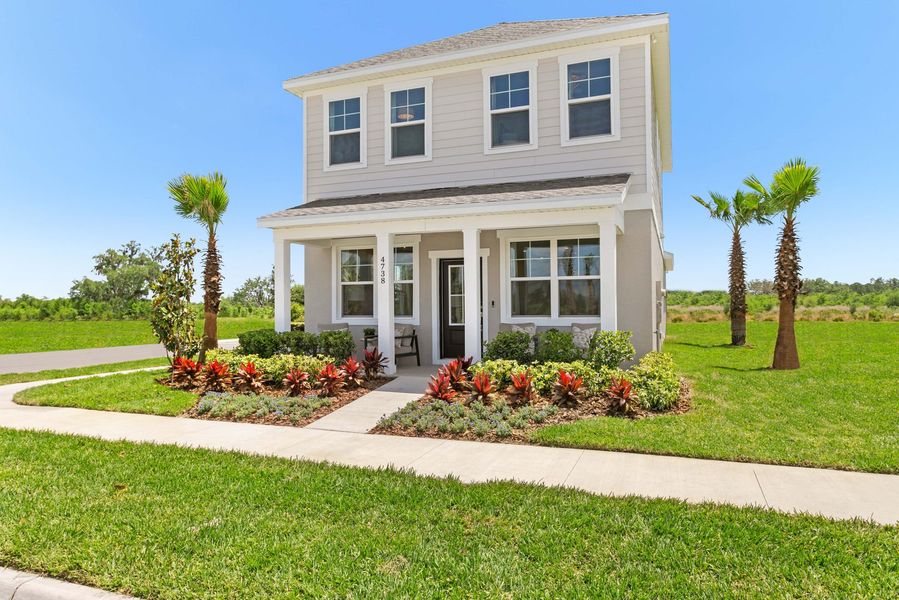 Front exterior of a new home in Brack Ranch, St. Cloud, FL, highlighting curb appeal (Image 2). Front exterior of a new home in Brack Ranch, St. Cloud, FL, highlighting curb appeal (Image 2).