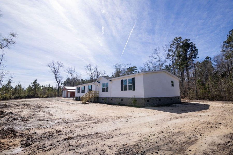 Exterior details and patio area of a home in , Cross (Image 24). Exterior details and patio area of a home in , Cross (Image 24).