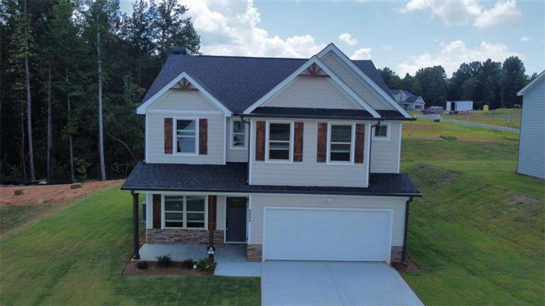 Front exterior of a new home in , Lula, GA, highlighting curb appeal (Image 2). Front exterior of a new home in , Lula, GA, highlighting curb appeal (Image 2).