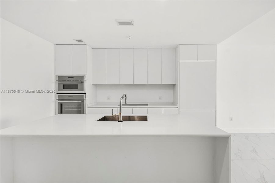 Furnished interior view inside a new home in Aria Reserve, Miami (Image 6).