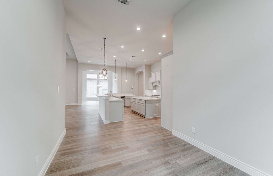 Representative unfurnished interior of a home built from the 3049 by Ravenna Homes in The Woodlands Hills 65′, Willis (Image 22). Representative unfurnished interior of a home built from the 3049 by Ravenna Homes in The Woodlands Hills 65′, Willis (Image 22).