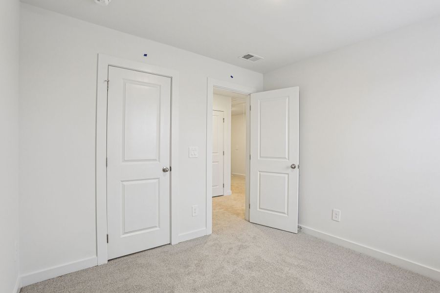 Spacious, unfurnished interior of a new home in Greystone - Highland Townhomes, Smyrna (Image 13).