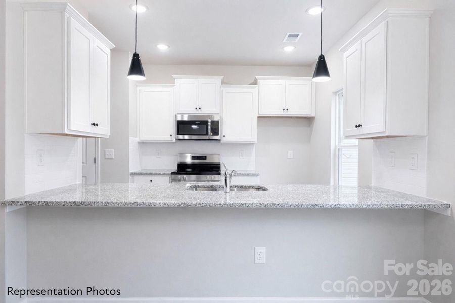 Furnished interior view inside a new home in , Charlotte (Image 5). Furnished interior view inside a new home in , Charlotte (Image 5).