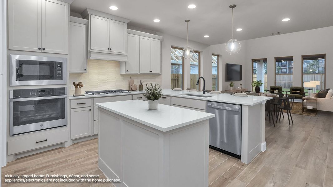 Furnished interior view inside a new home in Grand Central Park, Conroe (Image 3).