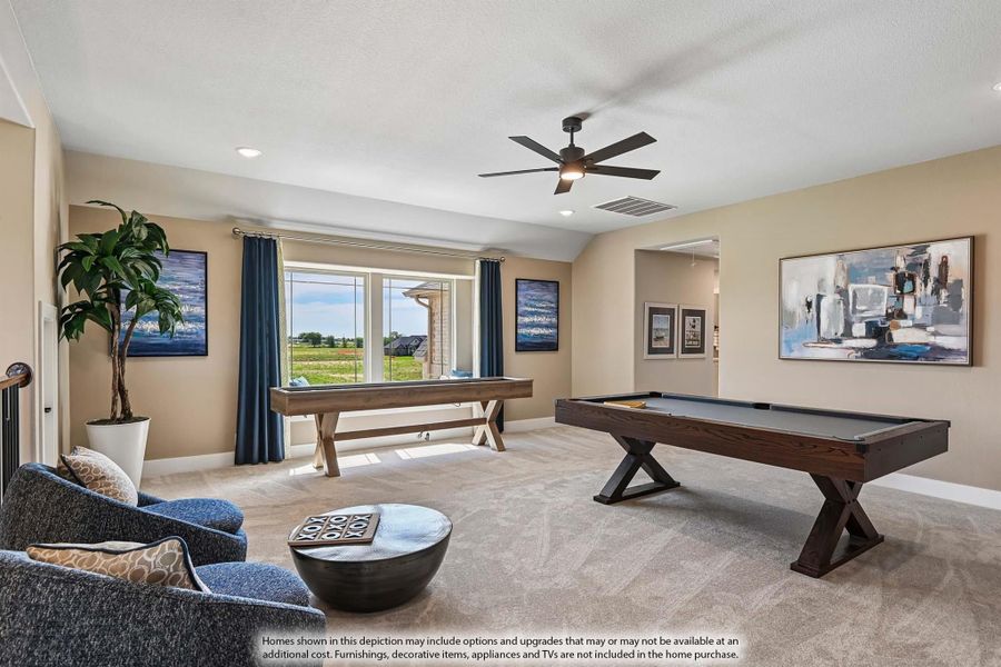 Game room with pool table, shuffleboard, ceiling fan, and carpet flooring Game room with pool table, shuffleboard, ceiling fan, and carpet flooring