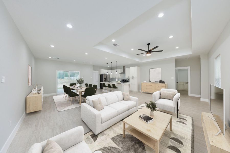 Living room featuring stylish wood-like floors, adding warmth and elegance to the space while enhancing durability.