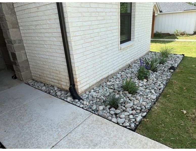 Exterior details and patio area of a home in , Denison (Image 22).