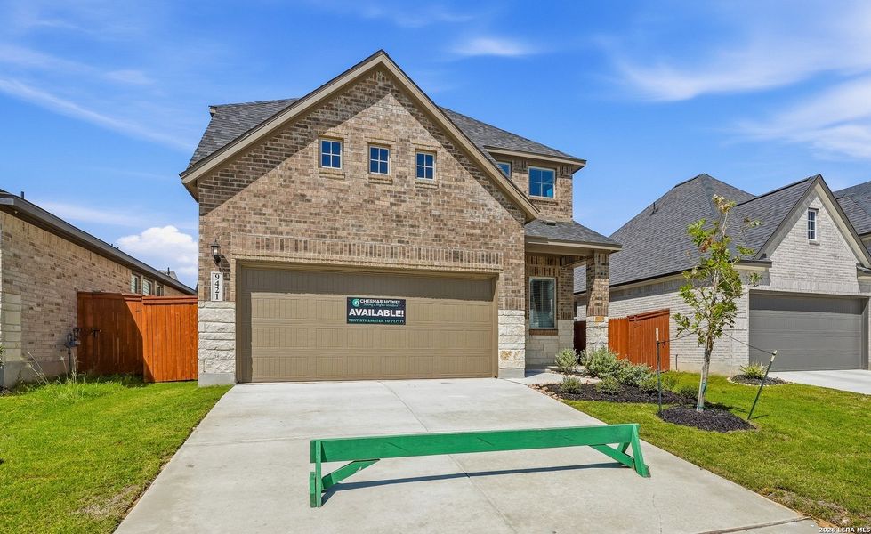 Front exterior of a new home in Stillwater Ranch, San Antonio, TX, highlighting curb appeal (Image 26). Front exterior of a new home in Stillwater Ranch, San Antonio, TX, highlighting curb appeal (Image 26).