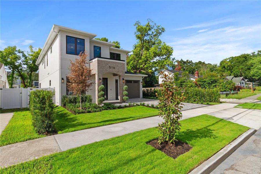 Front exterior of a new home in , Orlando, FL, highlighting curb appeal (Image 25). Front exterior of a new home in , Orlando, FL, highlighting curb appeal (Image 25).