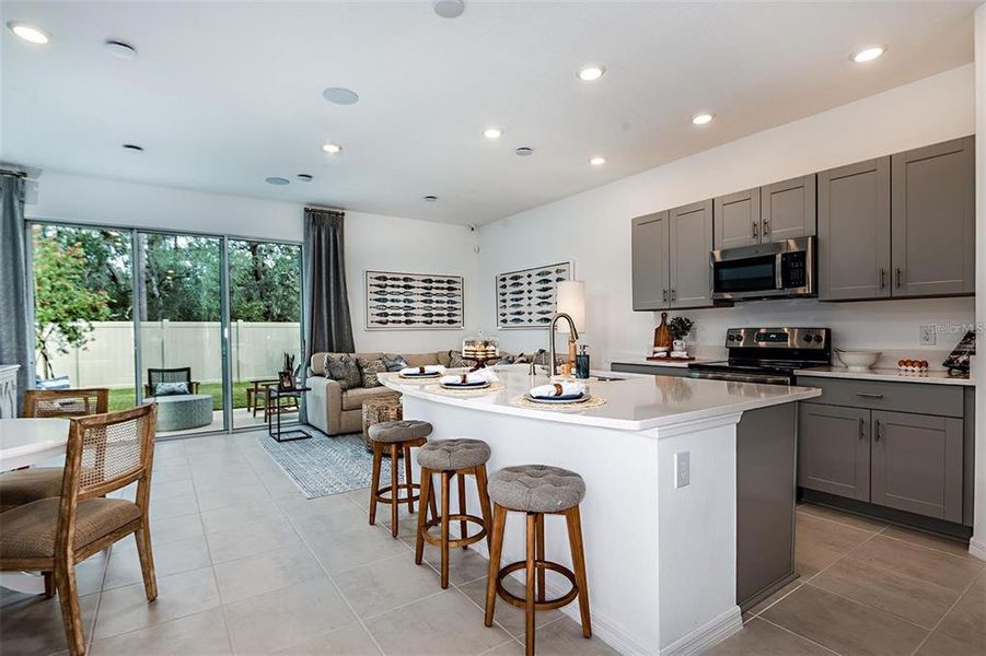 Furnished interior view inside a new home in The Townhomes at Anthem Park, St. Cloud (Image 11).