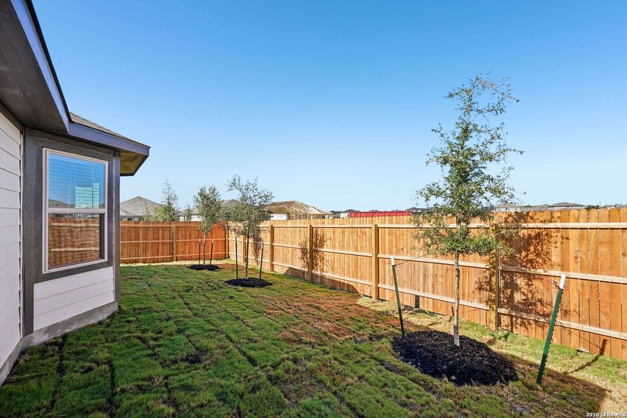 Exterior details and patio area of a home in Remington Ranch, San Antonio (Image 25).