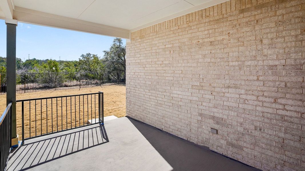 Exterior details and patio area of a home in Thunder Rock, Marble Falls (Image 4).