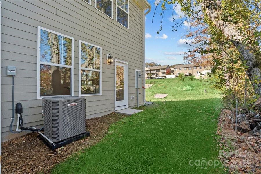 Exterior details and patio area of a home in Clayton Crossing, Arden (Image 3). Exterior details and patio area of a home in Clayton Crossing, Arden (Image 3).