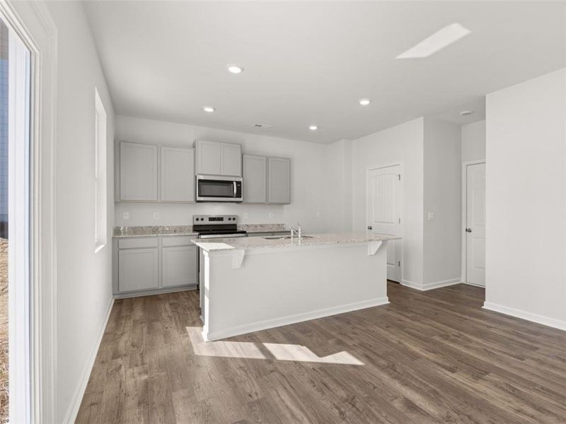 Furnished interior view inside a new home in Oaks at Cedar Grove, Fairburn (Image 4).