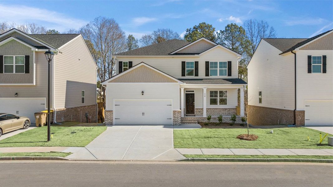 Front exterior of a new home in Captain's Corner, Grovetown, GA, highlighting curb appeal (Image 1).