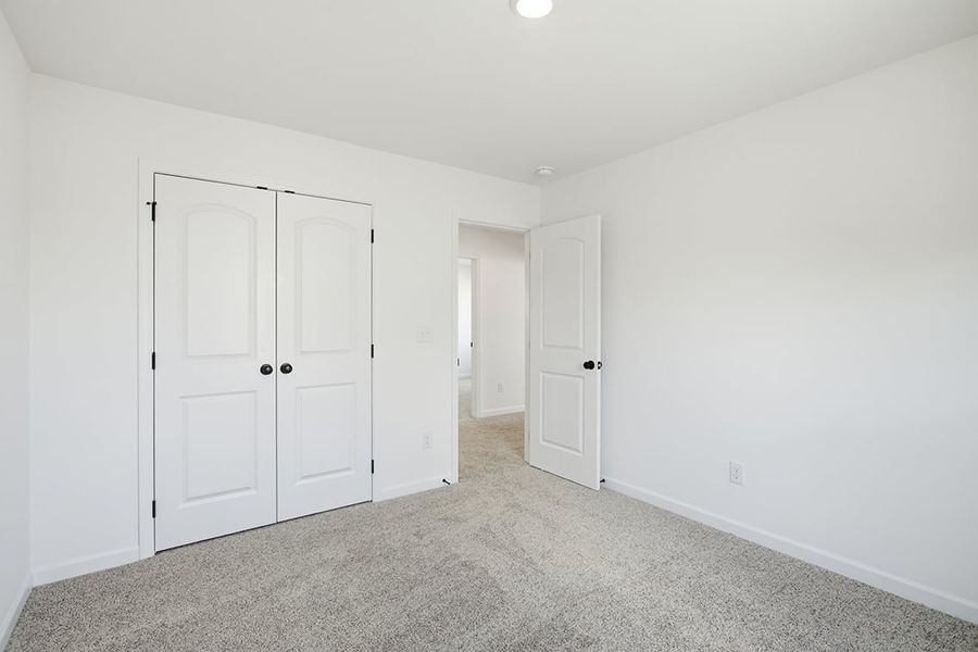 A room with white doors.