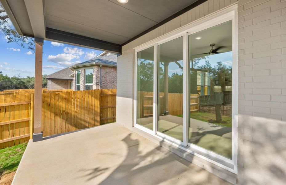Exterior details and patio area of a home in Woodside, Georgetown (Image 26).