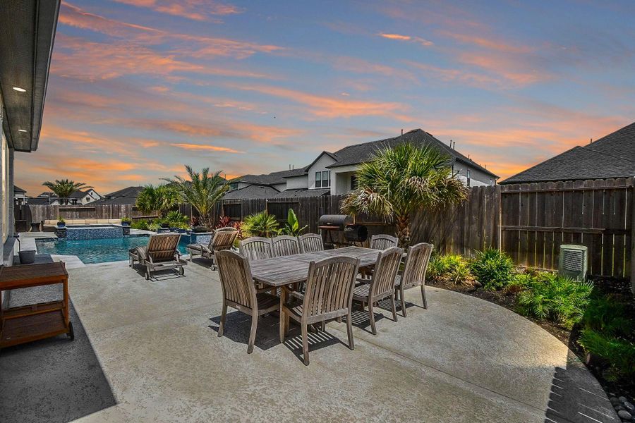The extended patio area is great for parties. There's also a separate concrete slab for your grill or smoker. The extended patio area is great for parties. There's also a separate concrete slab for your grill or smoker.