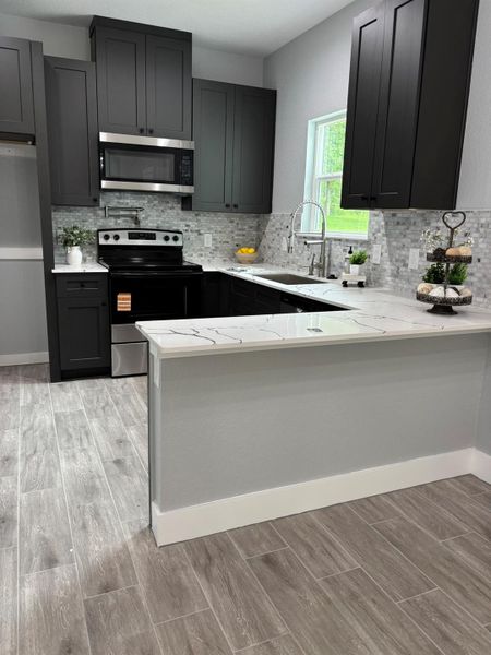 Furnished interior view inside a new home in , Willis (Image 7).