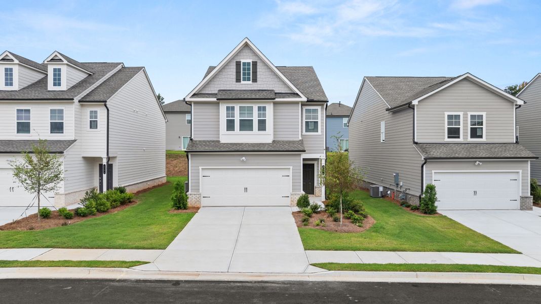 Front exterior of a new home in Timber Ridge: Timber Ridge 42', Douglasville, GA, highlighting curb appeal (Image 1). Front exterior of a new home in Timber Ridge: Timber Ridge 42', Douglasville, GA, highlighting curb appeal (Image 1).
